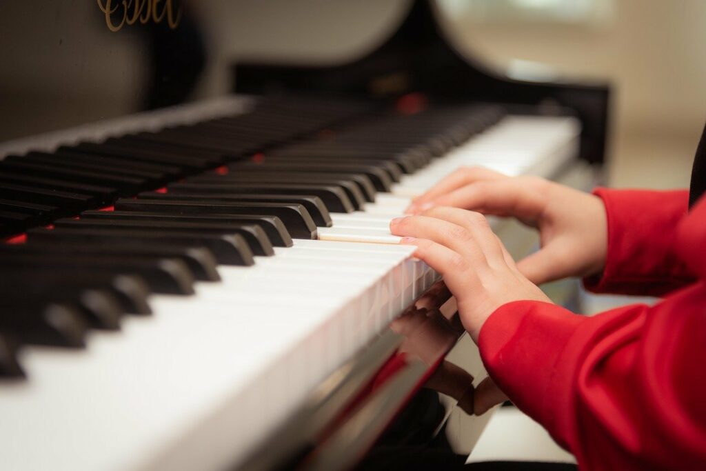 Kid playing piano