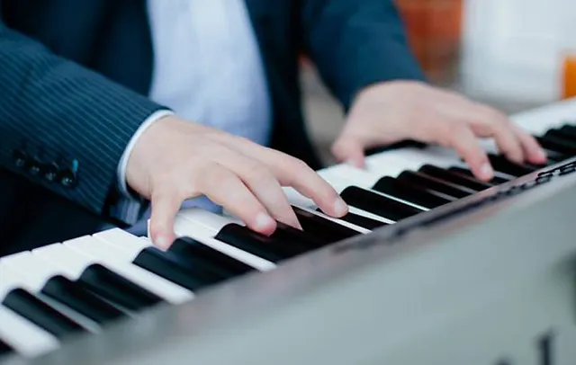 Man playing Keyboard