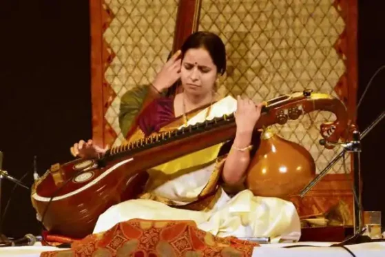 Women playing sitar and singing