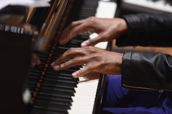 Role of Piano in Church Worship- man playing piano