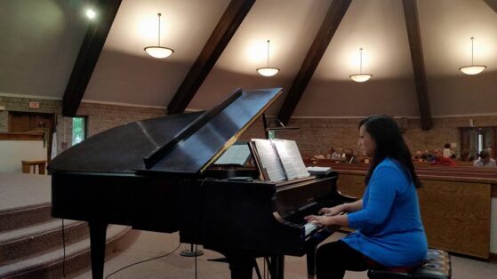 Spiritual Connection- Woman playing Piano