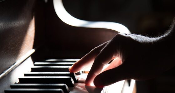 Role of Piano in Church Worship - Man playing piano