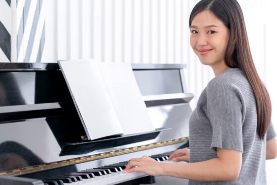 Common Struggles for Adult Piano Learners- Girl playing piano