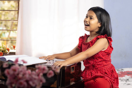 Hindustani Classical Music- girl playing harmonium