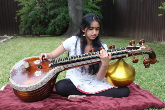 Hindustani Classical Music- girl playing Sitar