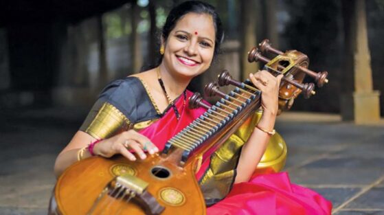 Carnatic music terms- woman playing veena