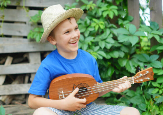 Learn Ukulele |  Boy playing Ukulele