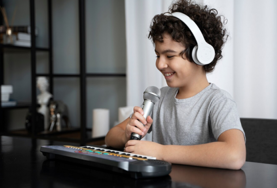 Boy singing and playing piano