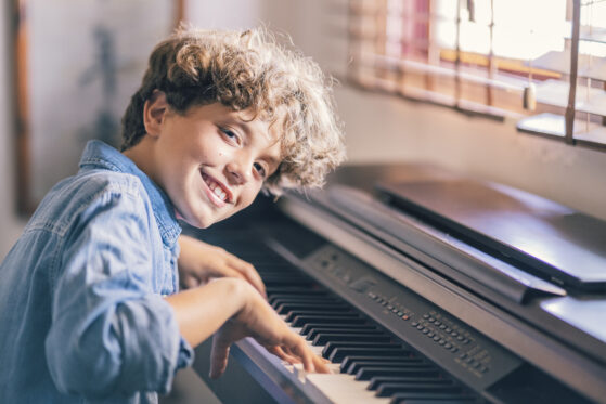 Boy playing keyboard 