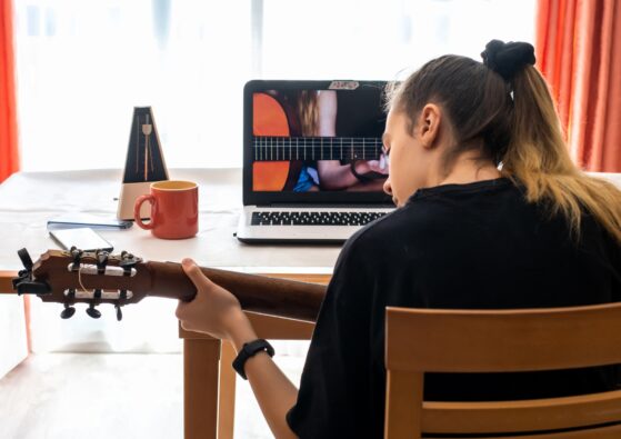 Personalized Learning | girl playing guitar