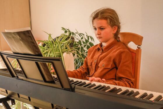 Girl playing piano