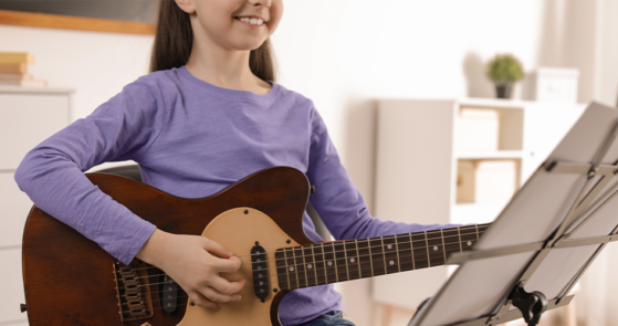 Girl playing guitar