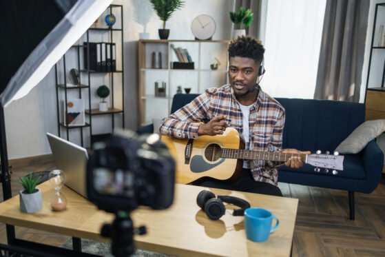 Recording music performances | Man playing guitar