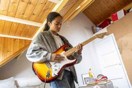 Man playing electric Guitar