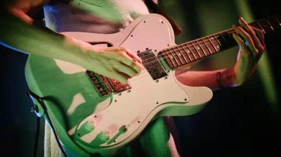 Girl playing guitar