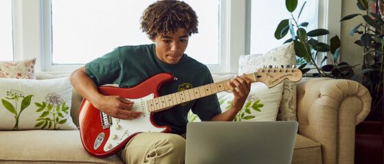 Boy playing guitar