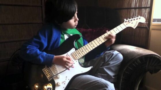 electric guitar techniques | Boy playing guitar