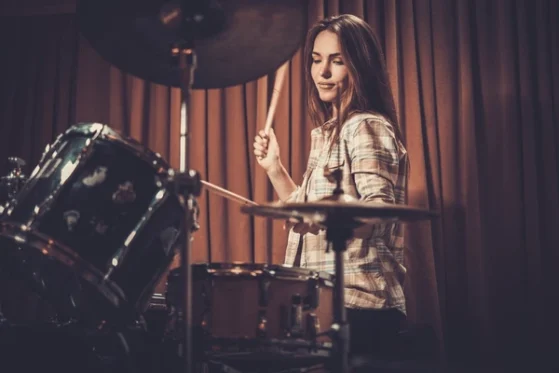 Girl playing drums