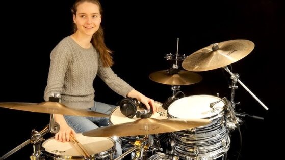 Girl playing drums