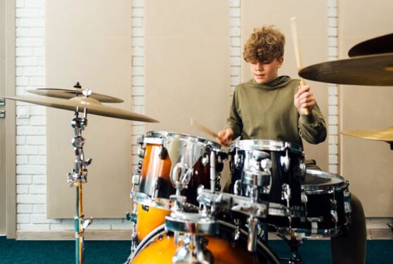 boy playing drums