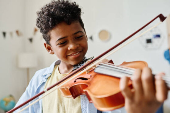 boy playing violin