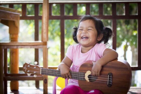 Girl playing Ukulele