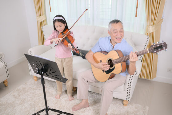 playing guitar and violin together