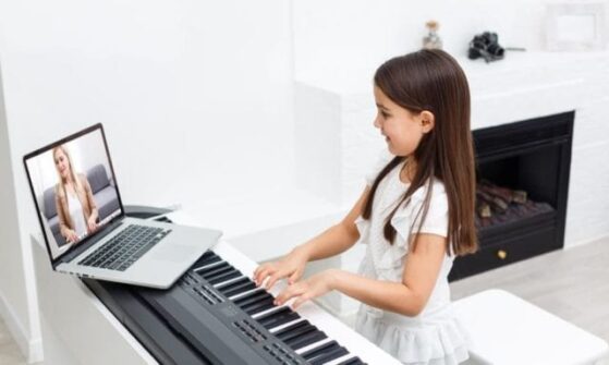 girl playing piano