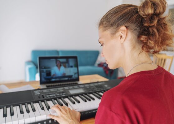 girl playing piano