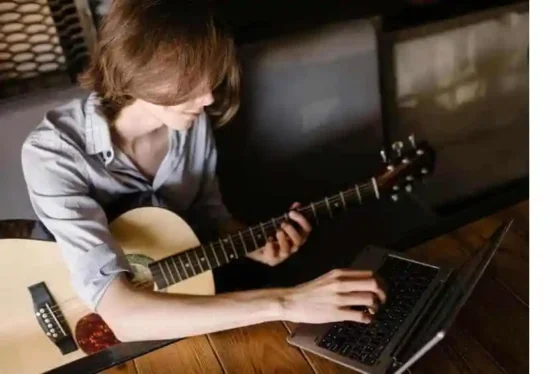 boy playing guitar