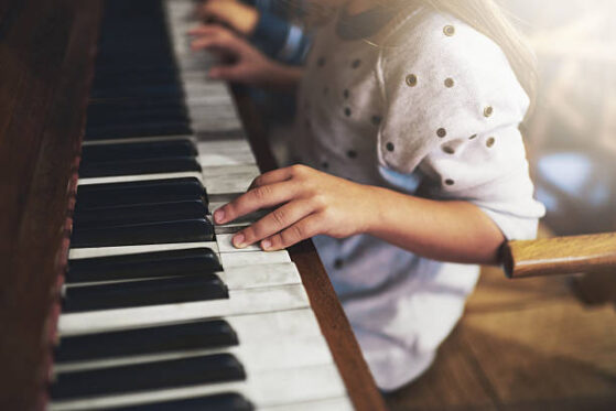 playing piano with left hand