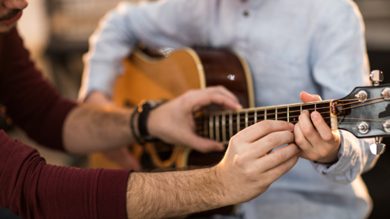 boy playing guitar