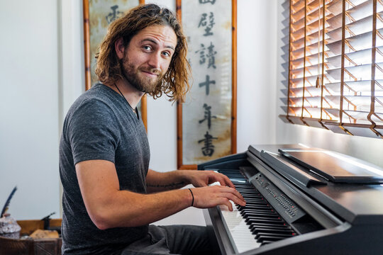 man playing piano