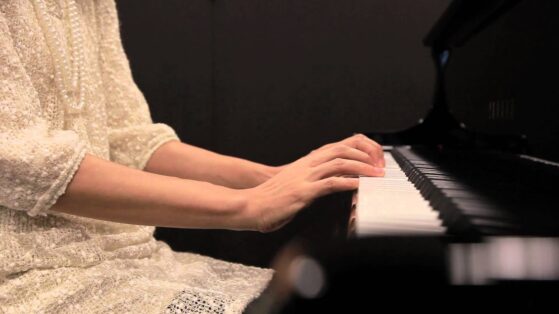 girl playing piano