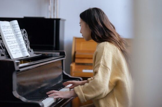 woman playing piano