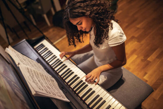 woman playing piano