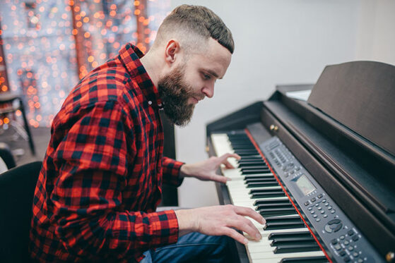 man playing piano
