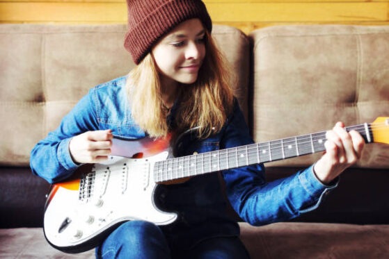Playing guitar