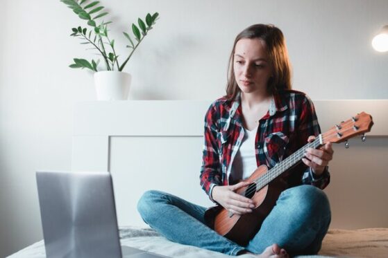 playing ukulele