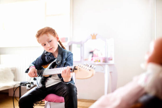 Playing guitar