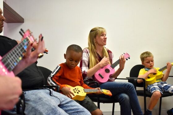 playing ukulele