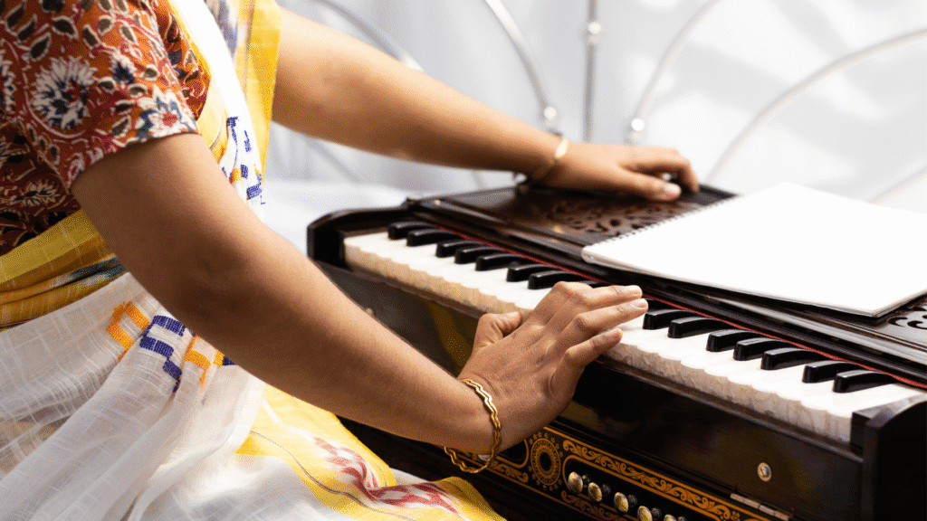 A woman practicing sruti in carnatic music