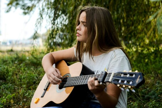 Playing guitar