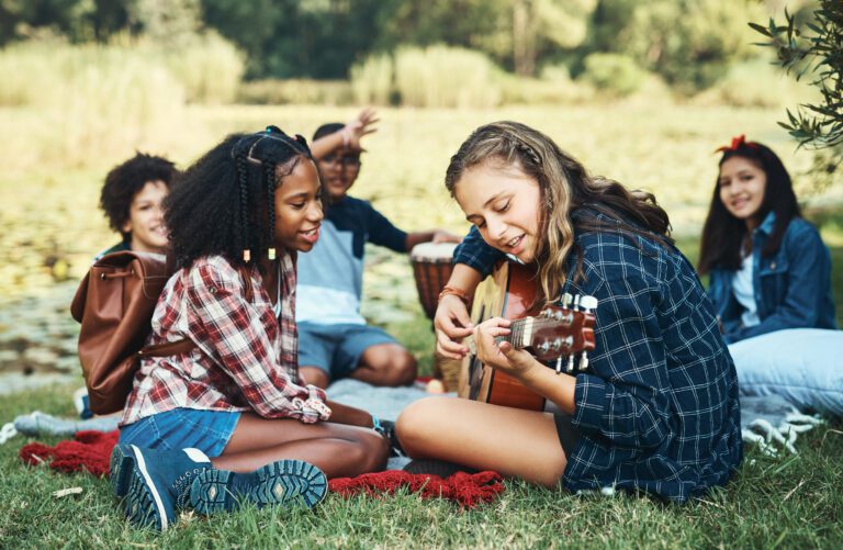 playing ukulele in a group