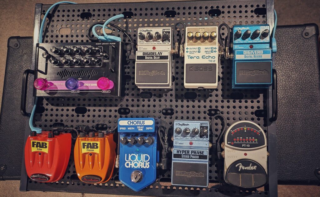 Worship guitar pedalboard setup featuring delay, reverb, chorus, phaser, and echo pedals used for ambient worship tones and modern church guitar sounds in “How to Play Lead Guitar in a Worship Band.