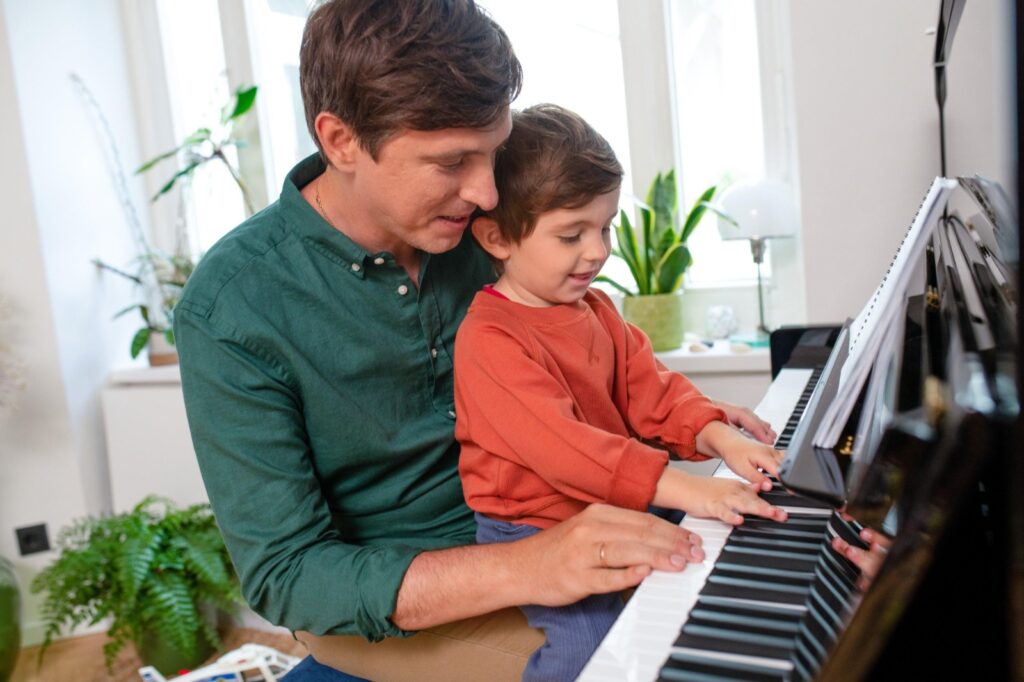 Parents Supporting Children at the Perfect Age to Learn Worship Music