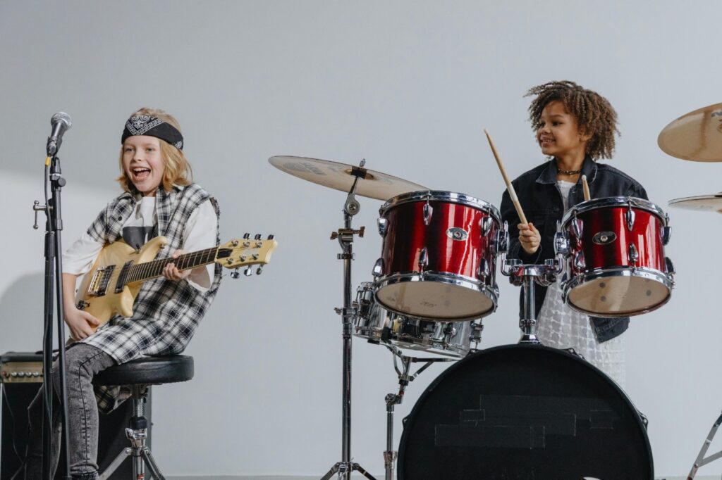 Young Students Learning Worship Music Through Group Performance