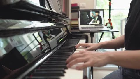 piano student focusing on accuracy