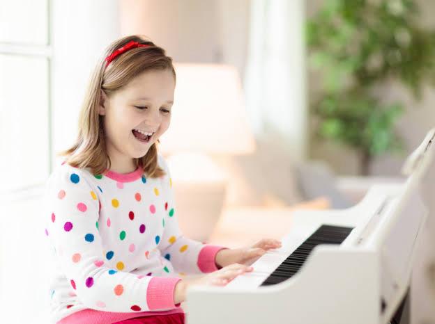 student learning ear training piano techniques for better performance