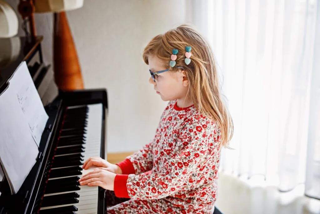 pianist practicing ear training piano skills on keyboard